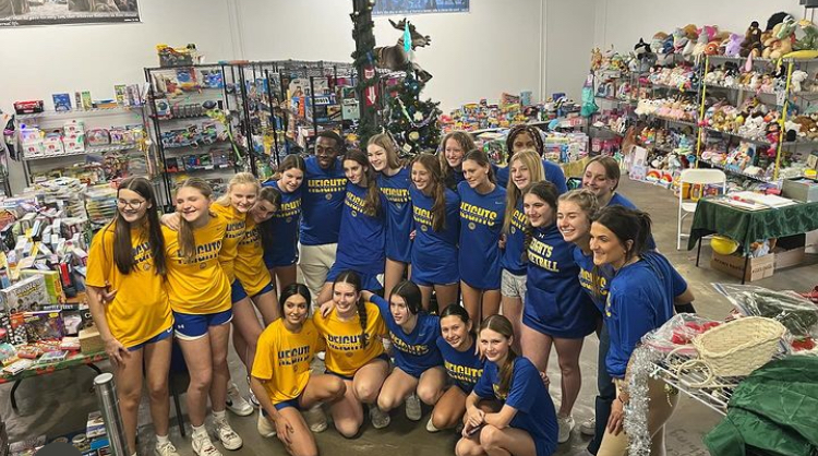 Heights Lady Hoops Volunteering at SAMMS Ministries